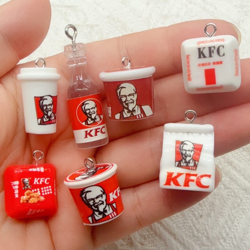 Novelty Gifts - 10 porte-clés en résine en forme